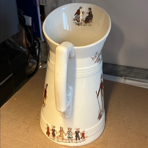 Elegant White Ceramic Pitcher with Illustrated Figures - Picture 2 of 4